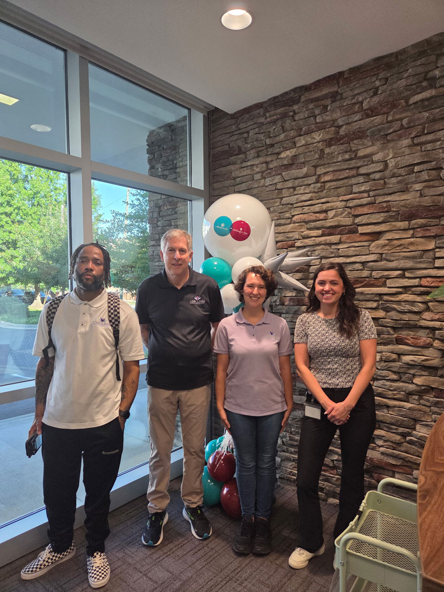 employee-appreciation Massage therapists group photo at event